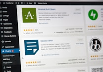 A computer screen displaying the WordPress dashboard with the Plugins section open. It shows various plugins such as Akismet Anti-Spam and Classic Editor with details like active installations, ratings, and update information. The left sidebar contains navigation options like Media, Comments, and Appearance.