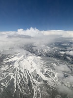 An aerial shot of the ski center Cerro Bayo surrounded by mountains.