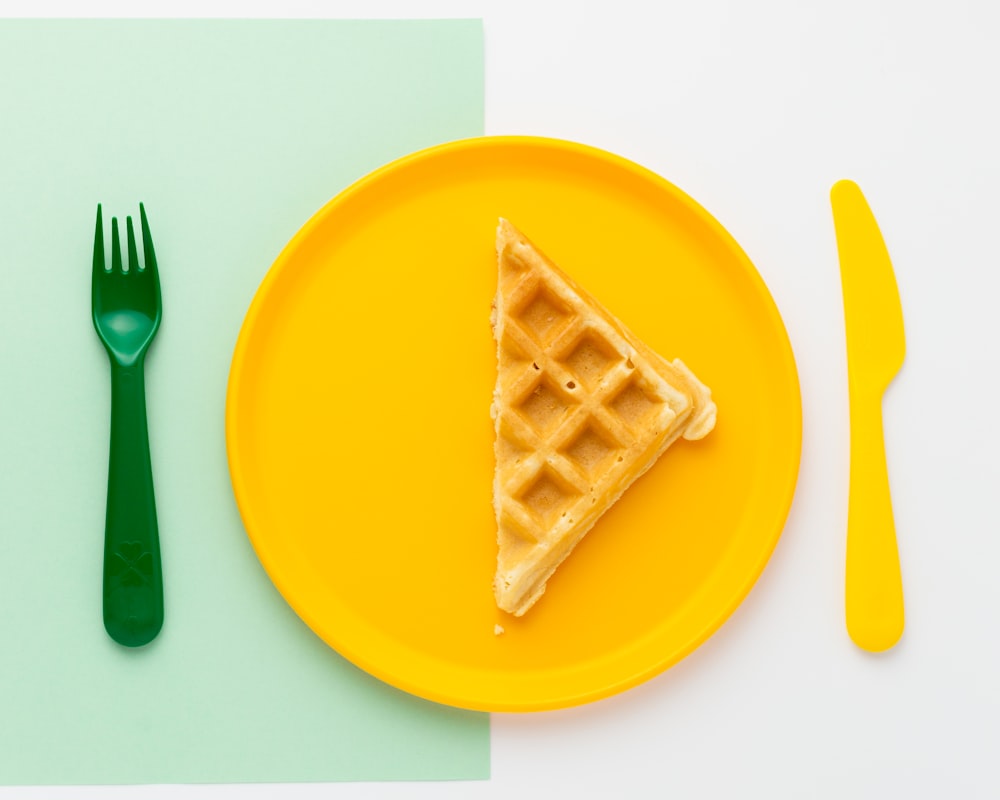 cake between knife and fork