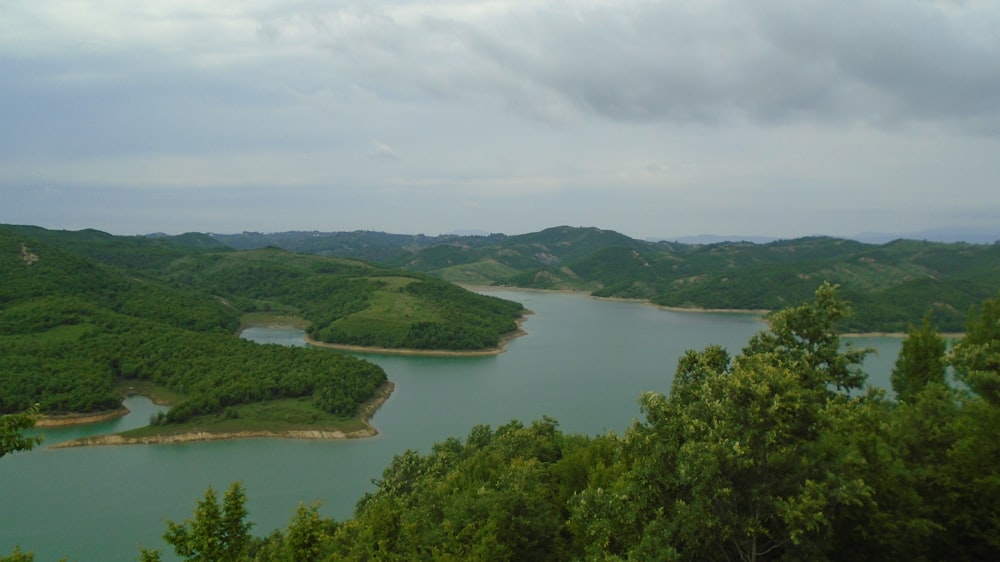 body of water near mountain