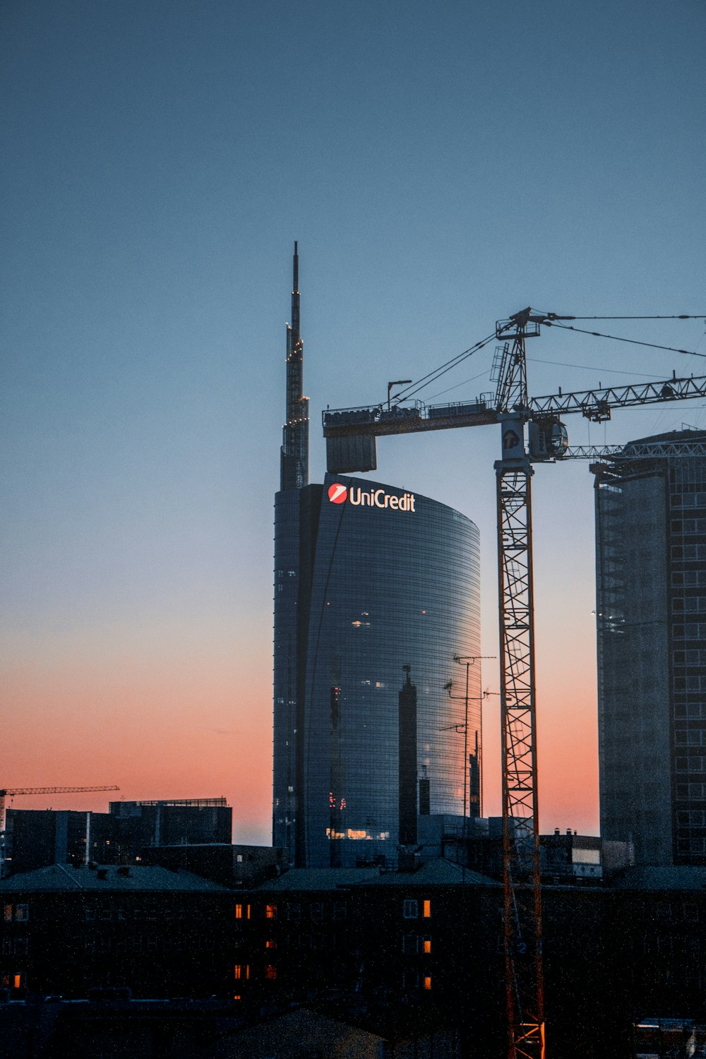 grey curtain building under blue sky