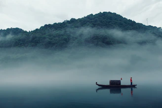 rule of thirds photography of boat on body of water