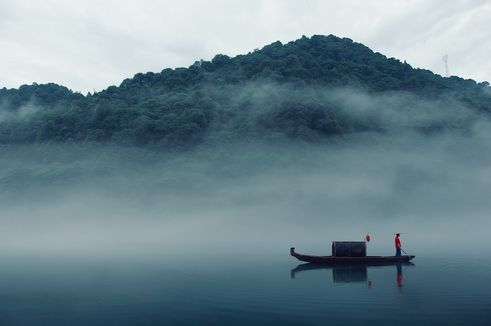 rule of thirds photography of boat on body of water