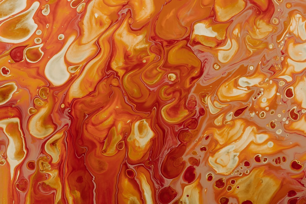 a painting of orange and yellow colors