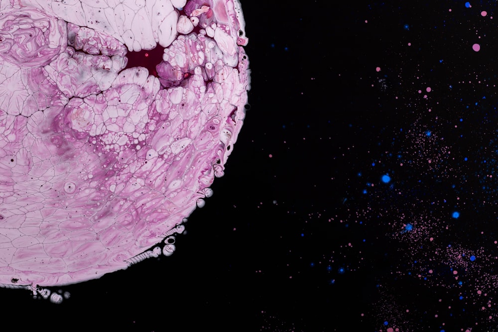 close view of pink planet cartoon image