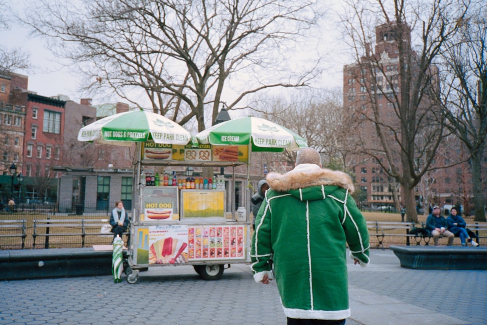 person wearing green jacket