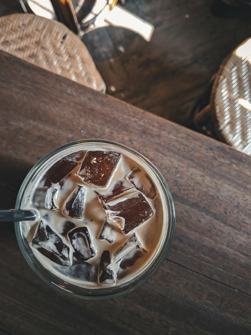 brown liquid in drinking glass