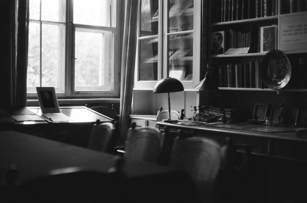 grayscale photo of an office interior