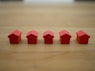 red blocks on brown wooden table