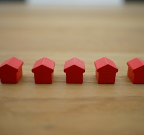 red blocks on brown wooden table