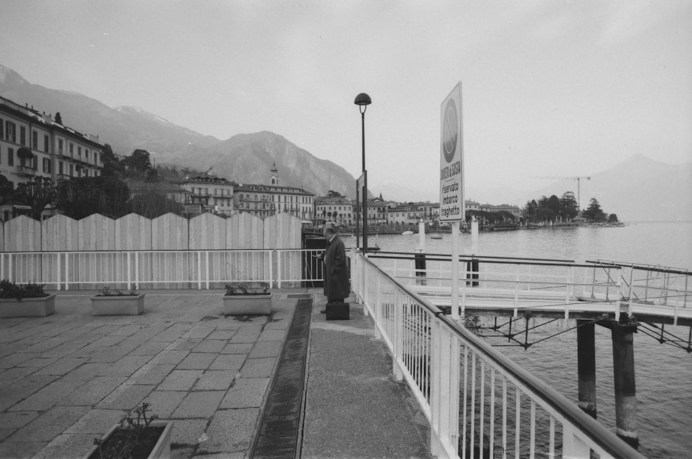 lot beside a body of water gray-scale photography