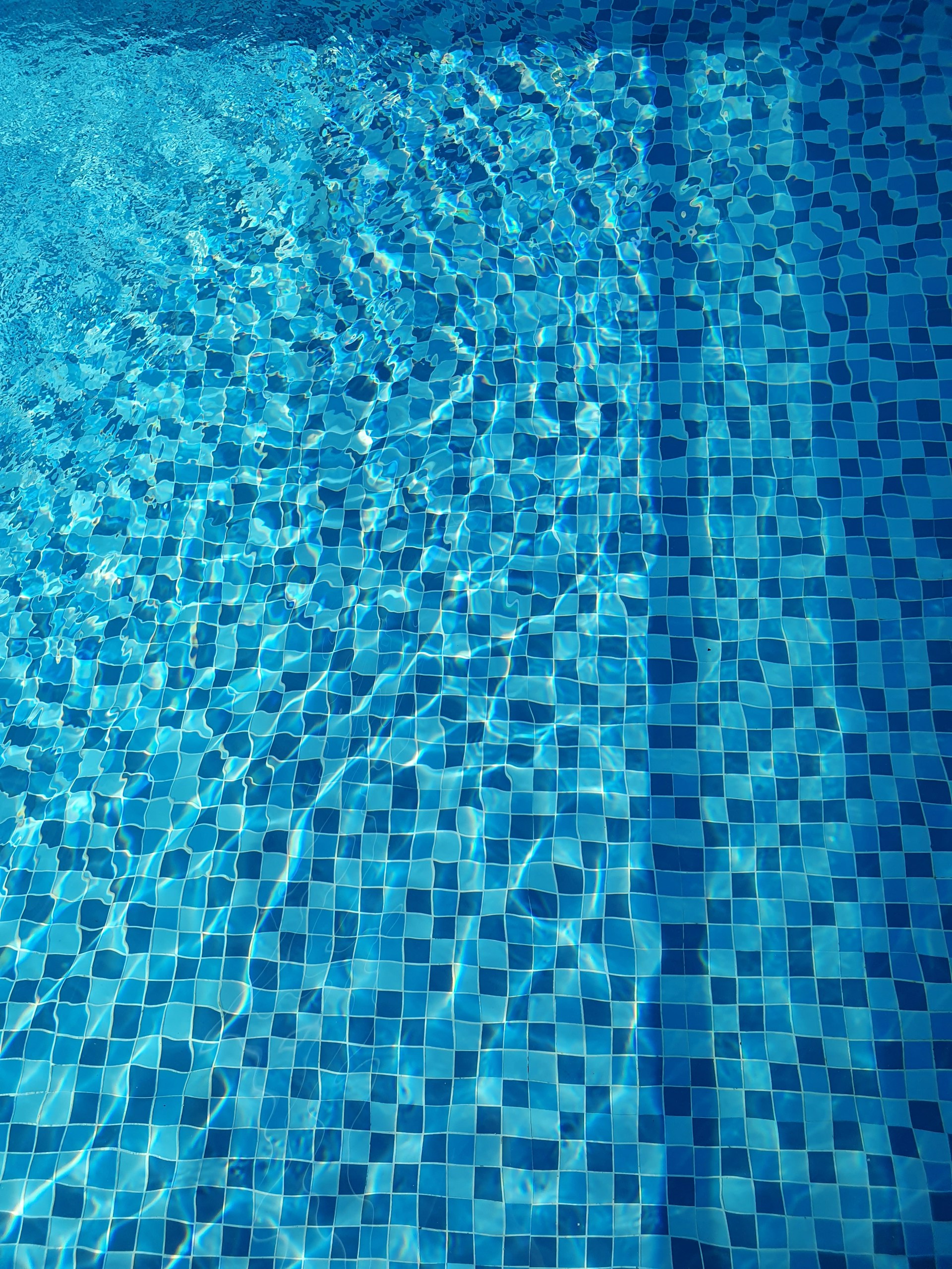 woman wearing yellow long-sleeved dress under white clouds and blue sky during daytime