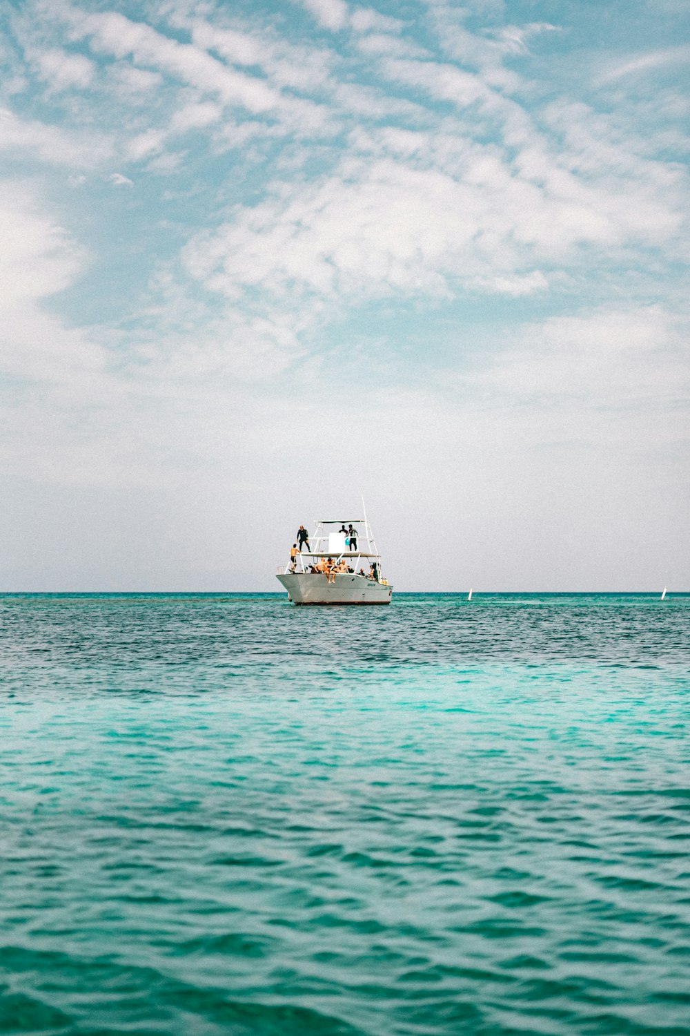 a large boat floating on top of a large body of water