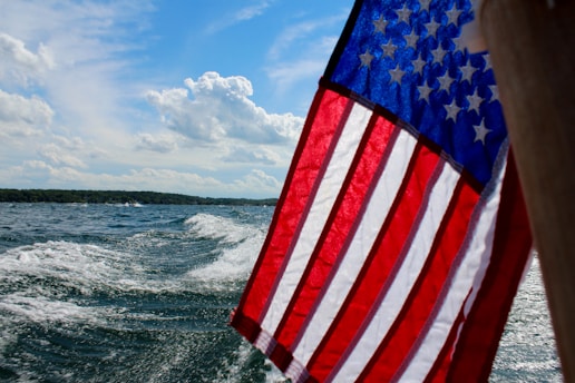 A vibrant image of the American flag waving in the wind.