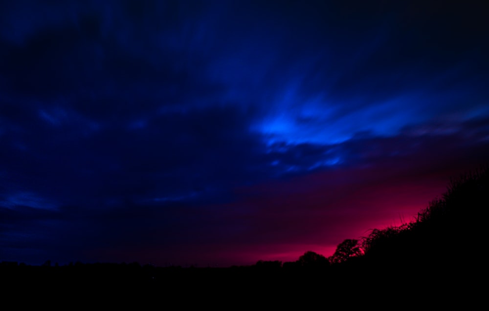 purple and blue sky during sunset