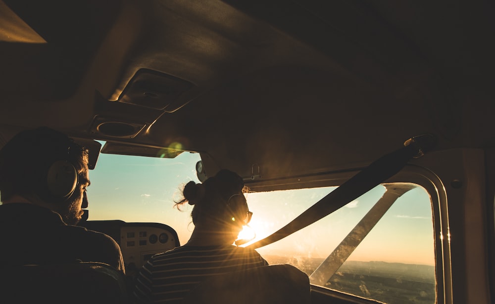 silhouette of person inside plane