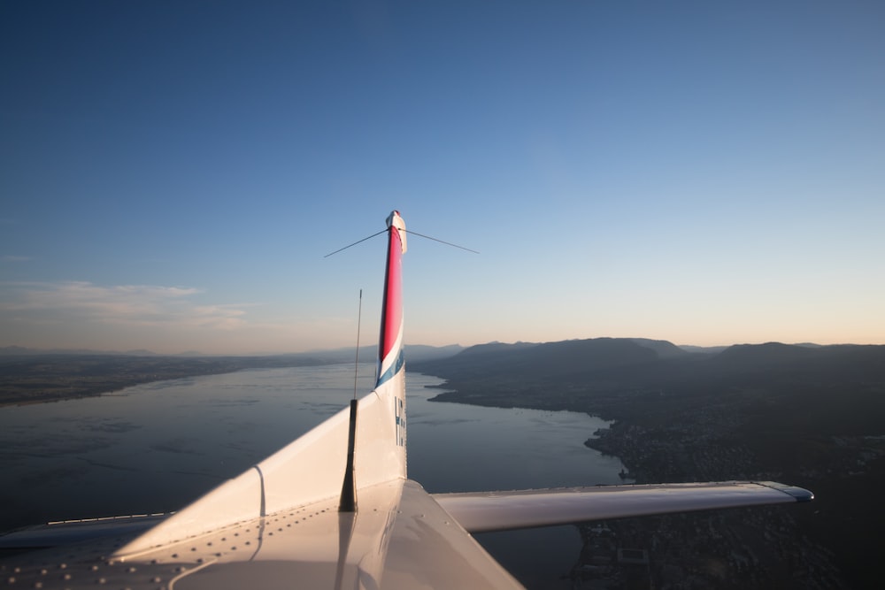 white and red plane