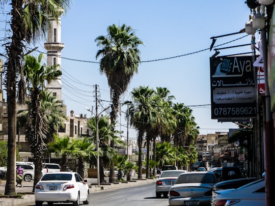 white sedan on road in Ramtha Jordan