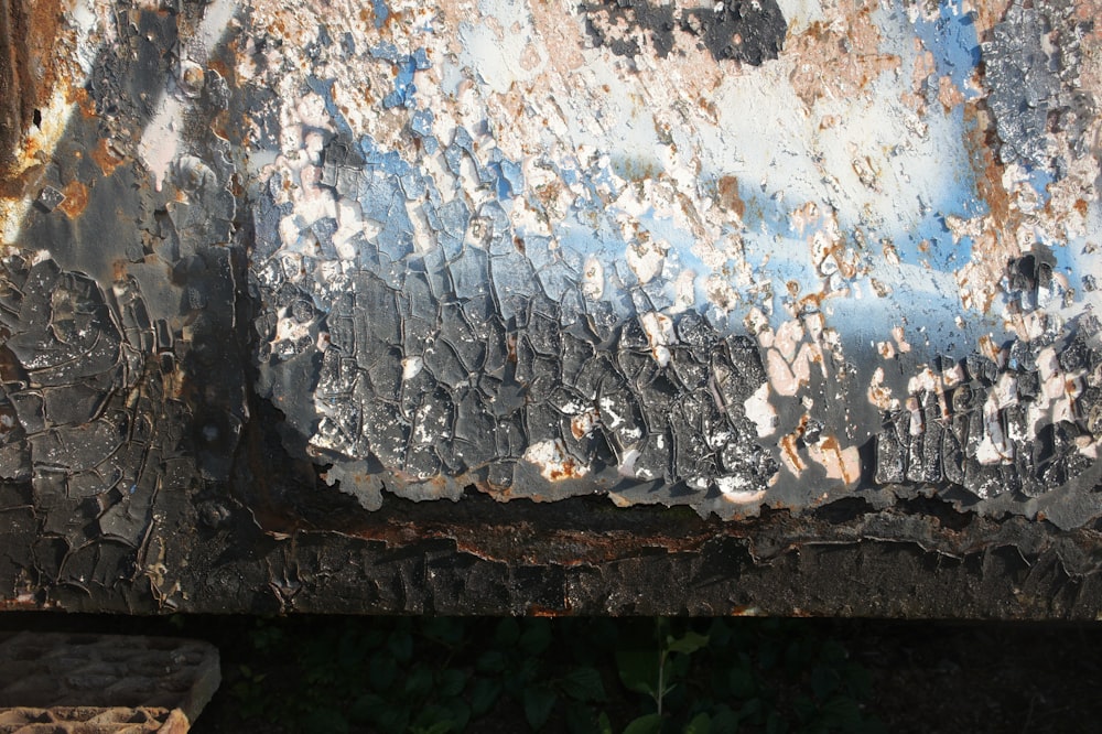 a close up of a rusted metal surface