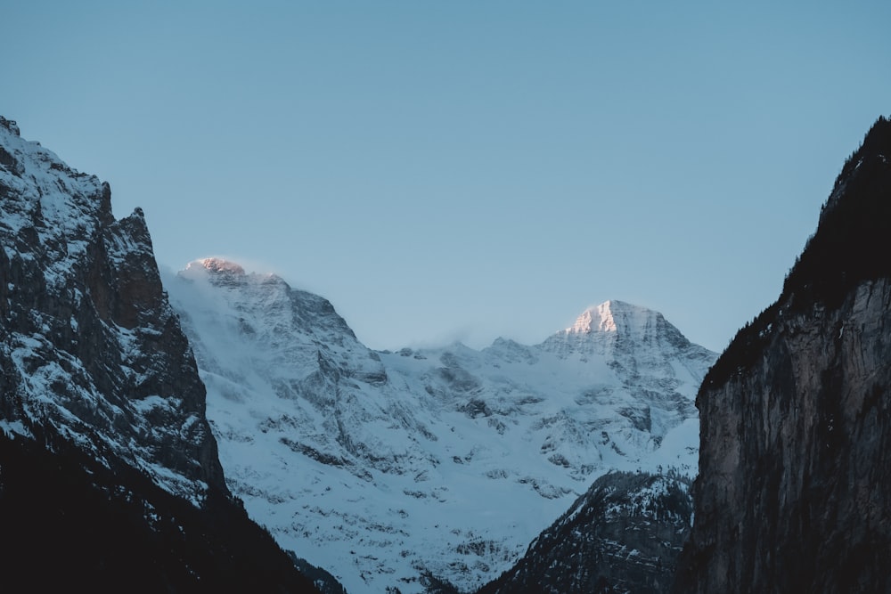 snow covered mountain during daytime