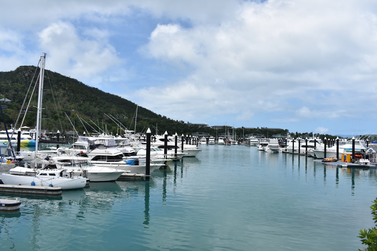 Glassy October Whitsunday channel with bareboat charters