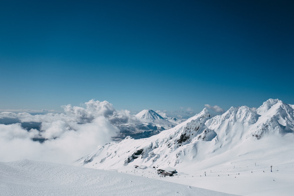 snow covered mountain during daytime