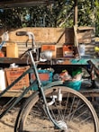 A collection of bicycle accessories displayed on a shelf.