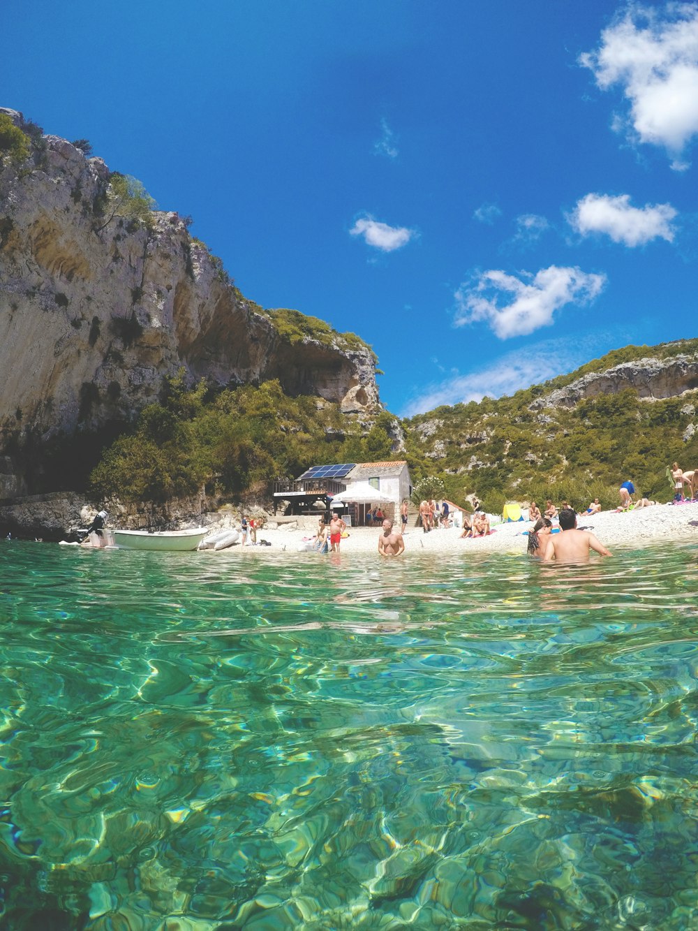 people on body of water during daytime