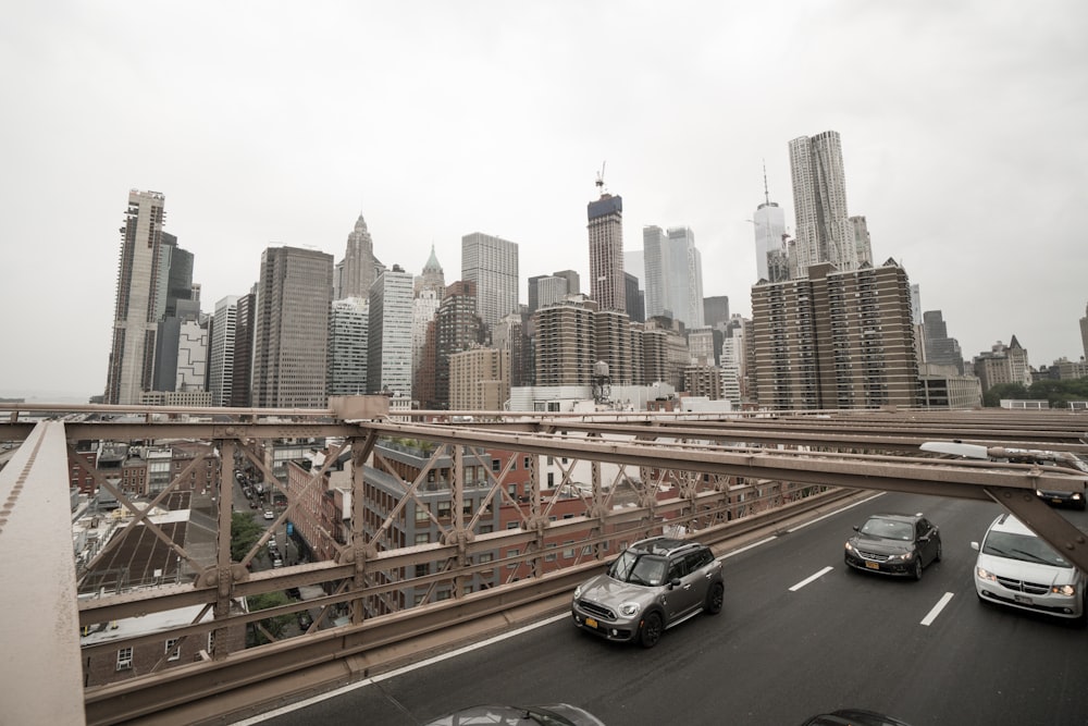 vehicle crossing bridge during daytime