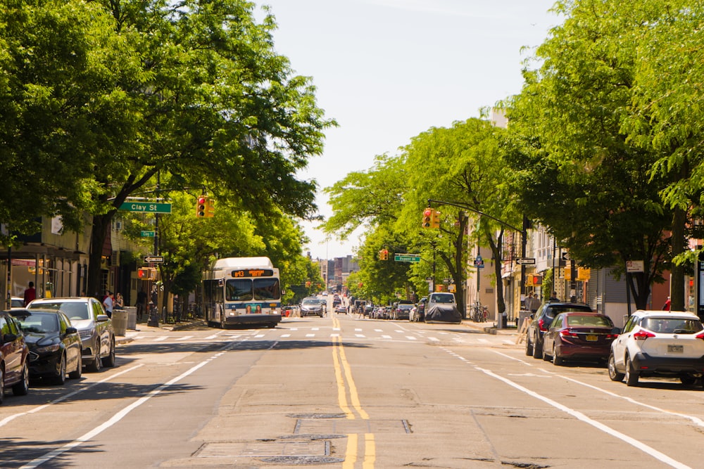 vehicles parked on side of road during daytime