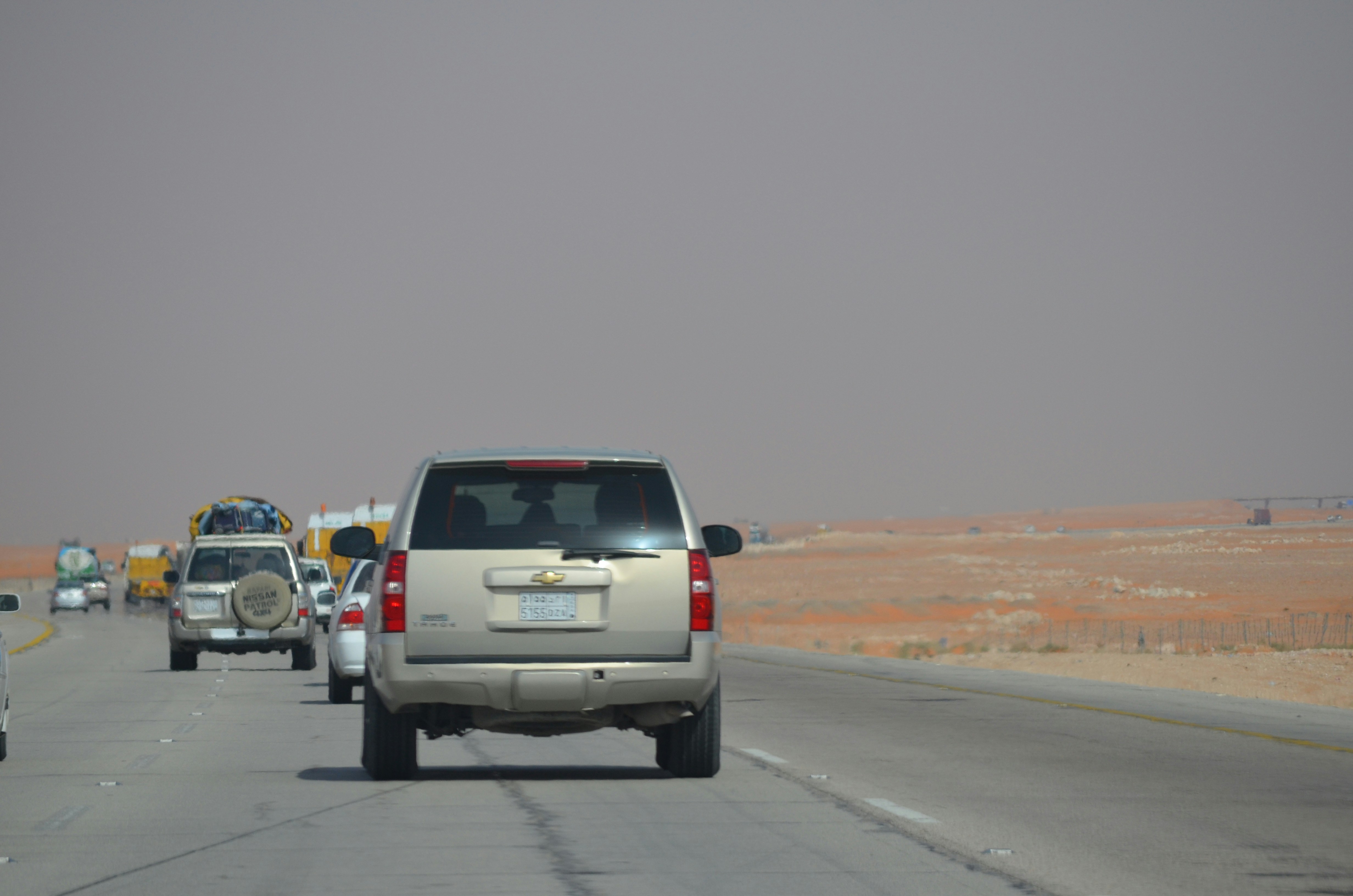 silver Chevrolet car on road