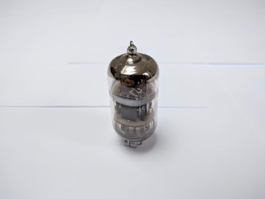 Side view of an eb-sources evaporation source installed in a vacuum chamber, highlighting its compact design.