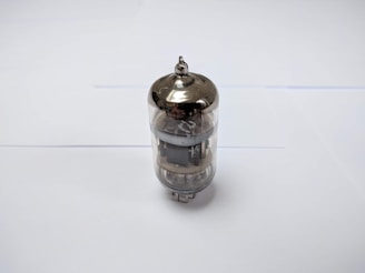 Side view of an eb-sources evaporation source mounted inside a vacuum chamber, highlighting its compact design.