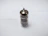 Close-up of a vintage-style vacuum tube glowing warmly inside a sleek steel chassis preamp.