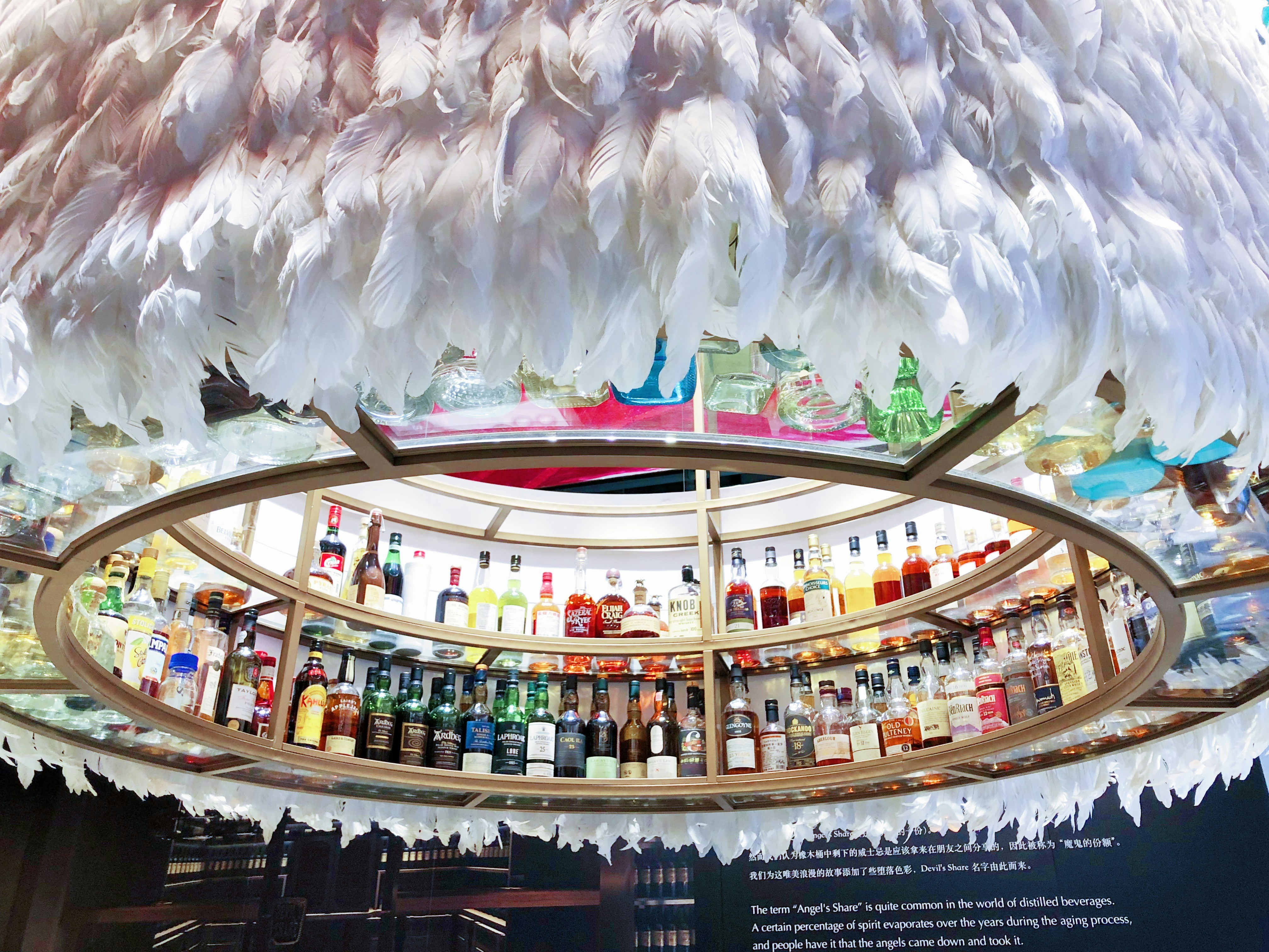 assorted-color wine bottles on shelf