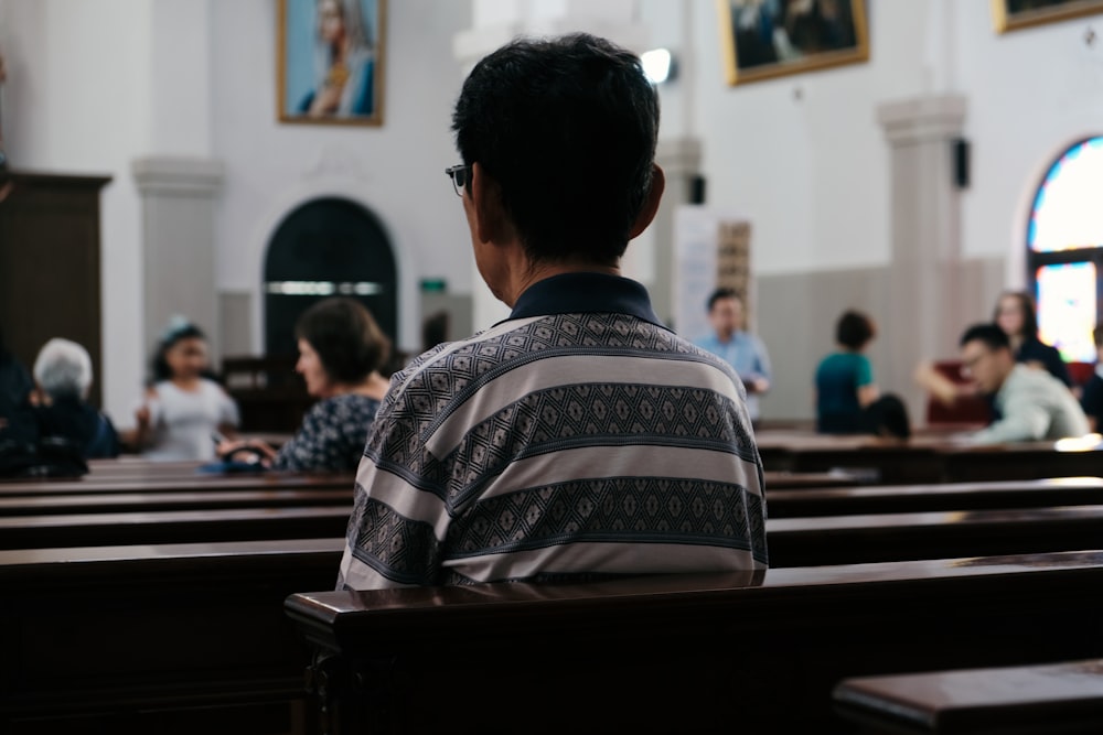 person sitting inside church