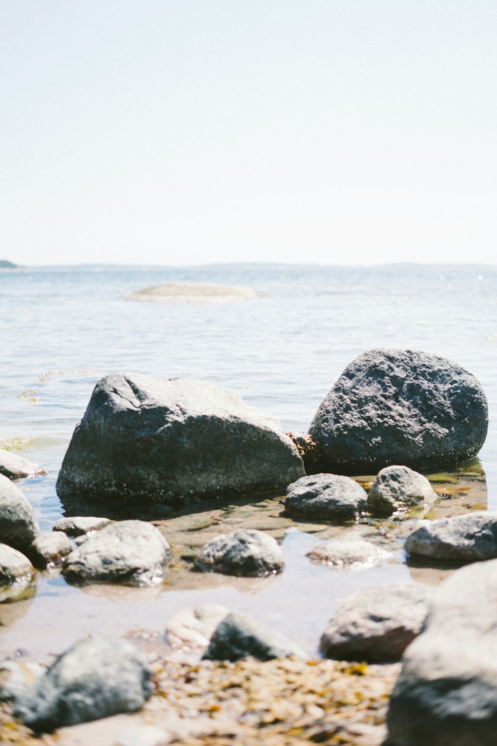 stones on shore during day