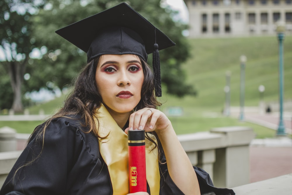 woman wearing black academic gown