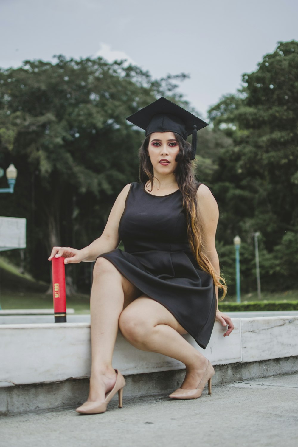 woman wearing black sleeveless dress