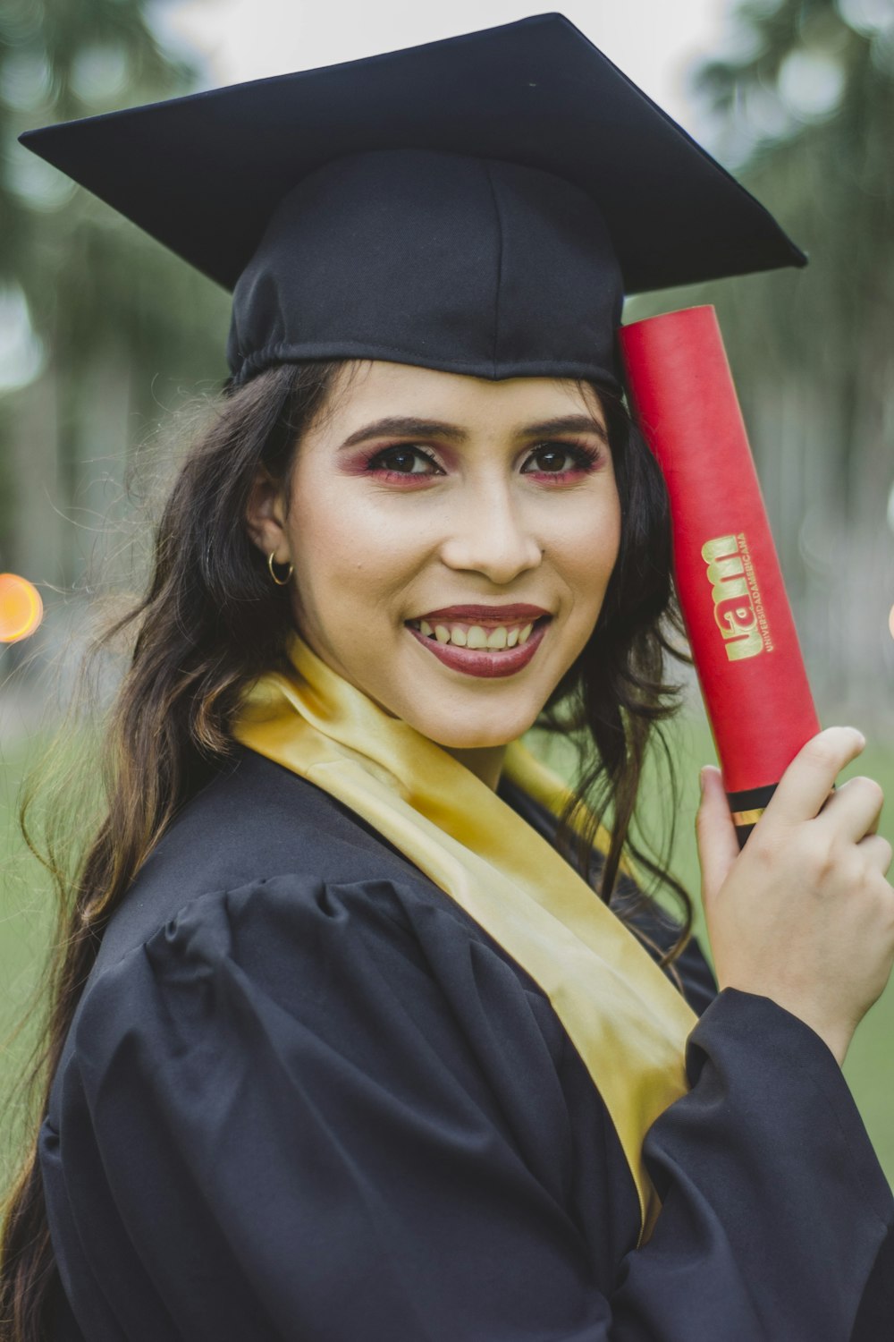 woman wearing graduation gown