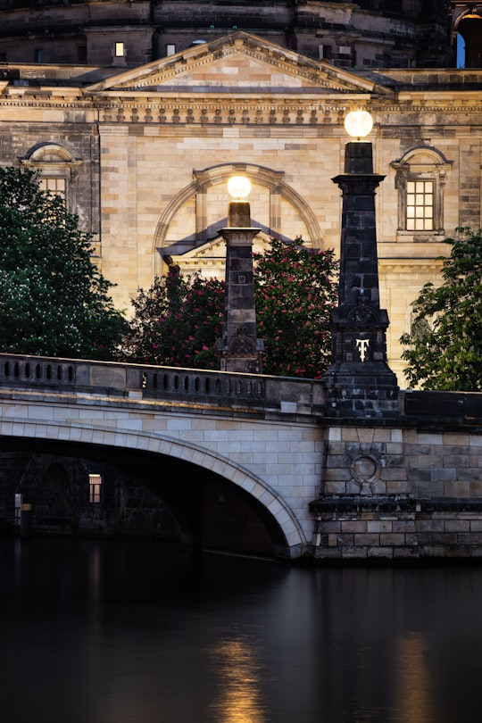 architectural photography of white, brown, and black bridge in Bode Museum Germany