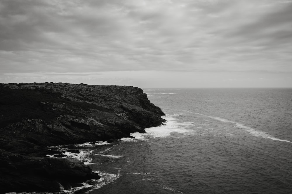 grayscale photo of body of water