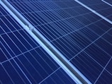 architectural photography of blue and white satellite panel