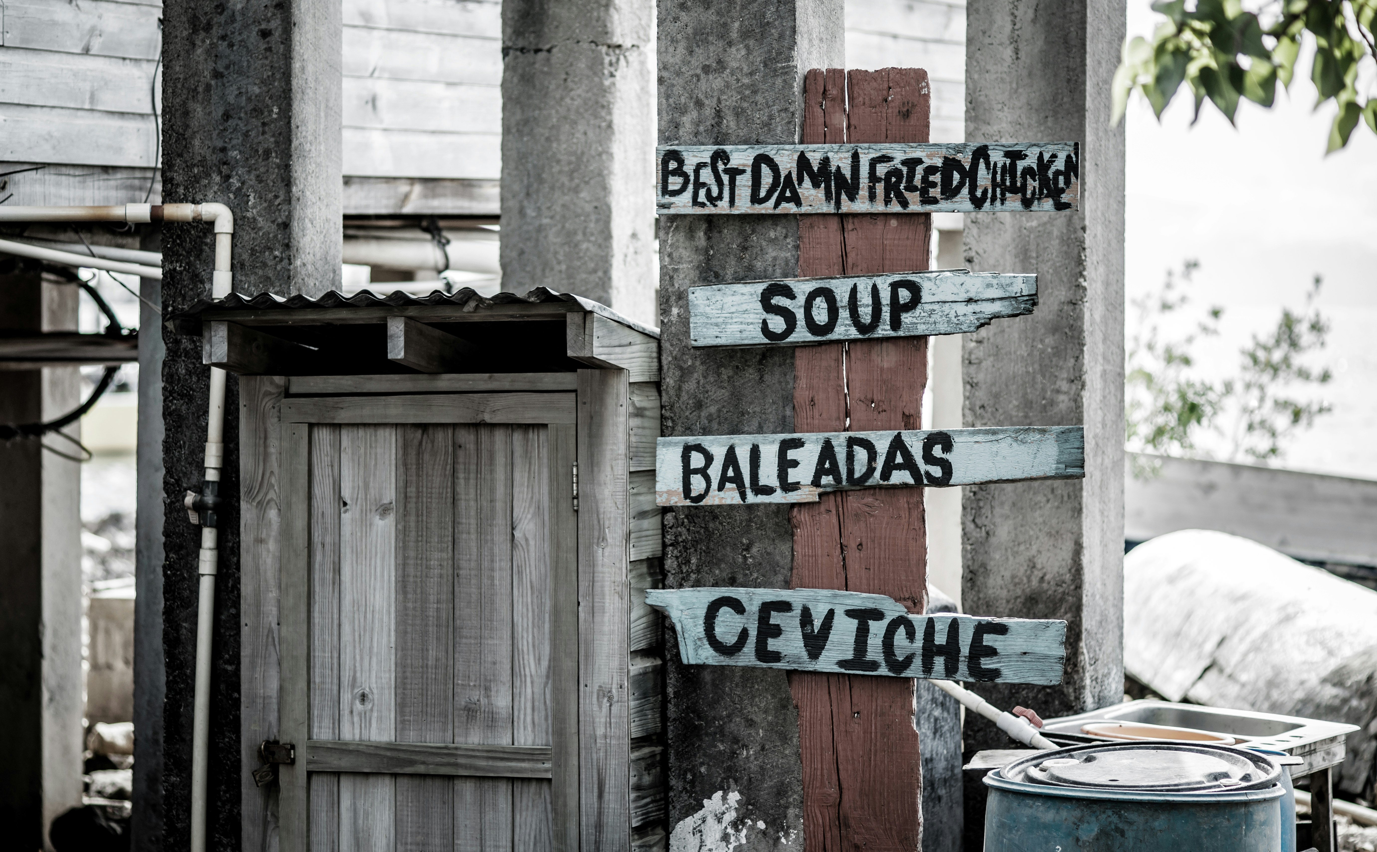 four sing board in a lot close-up photography