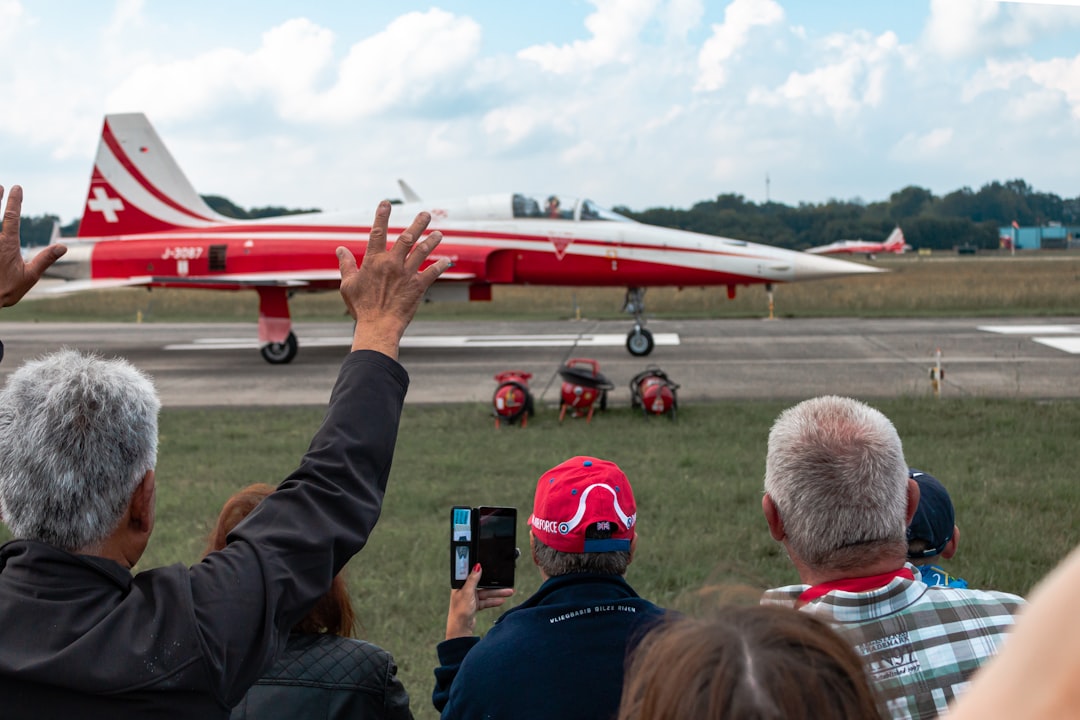 people watching red jet