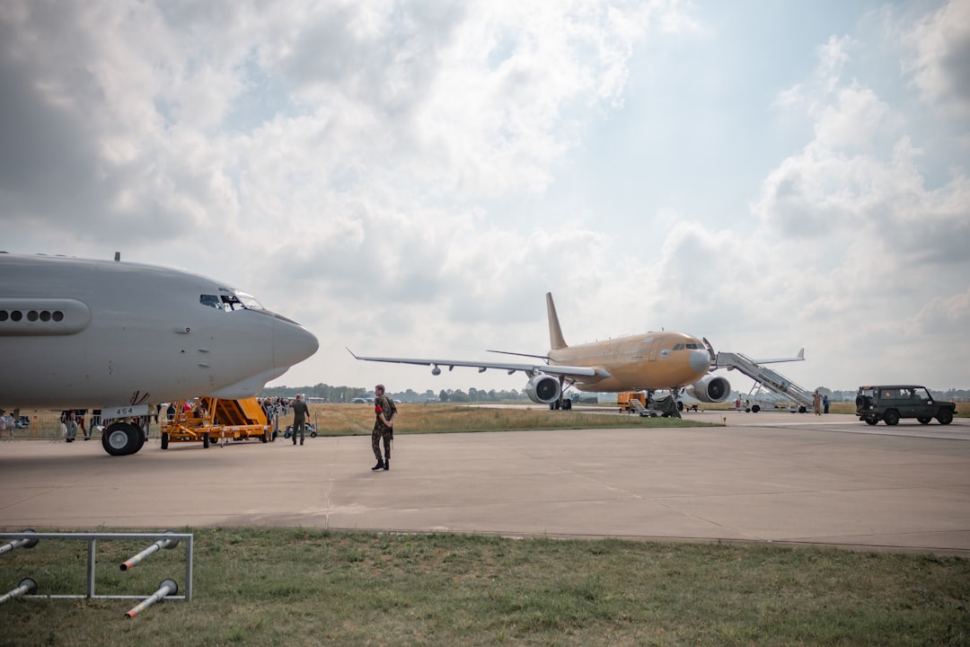 man near airplane,
