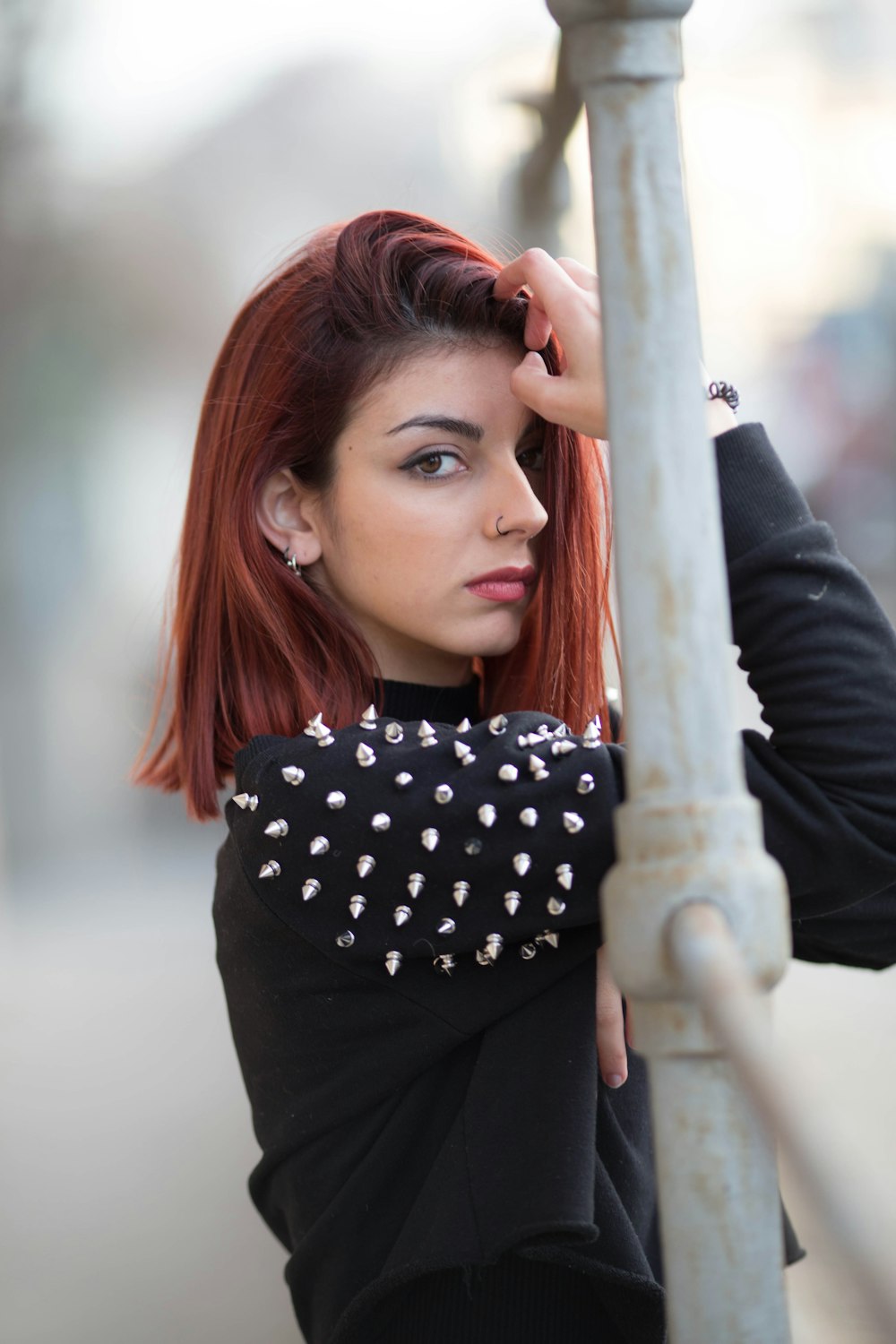 woman leaning on railing