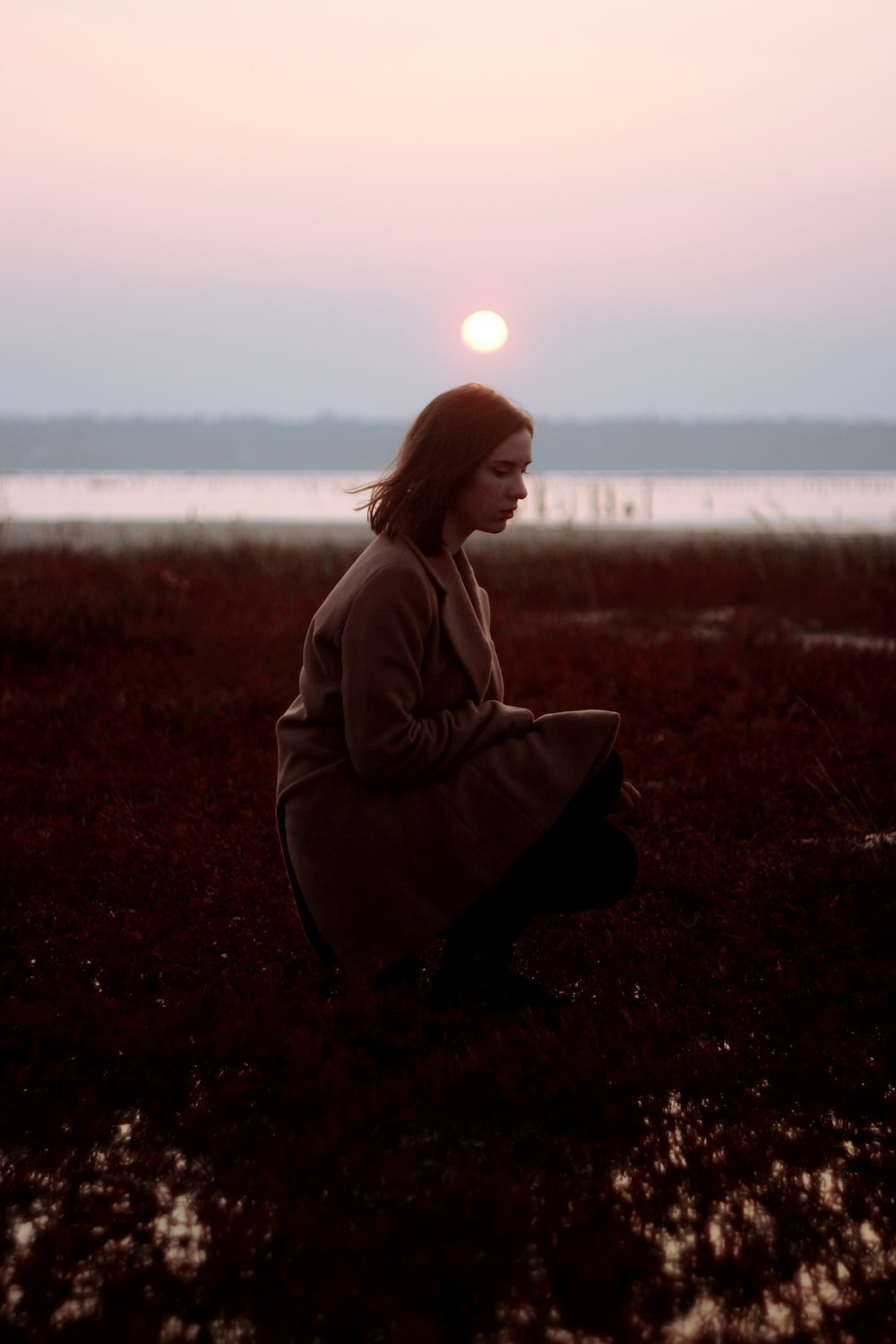 woman in trench coat