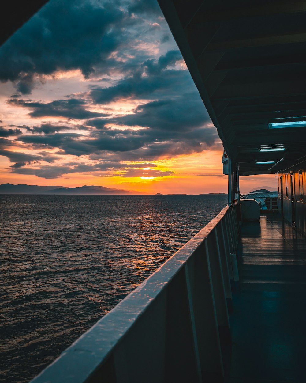 ship on the ocean during golden hour