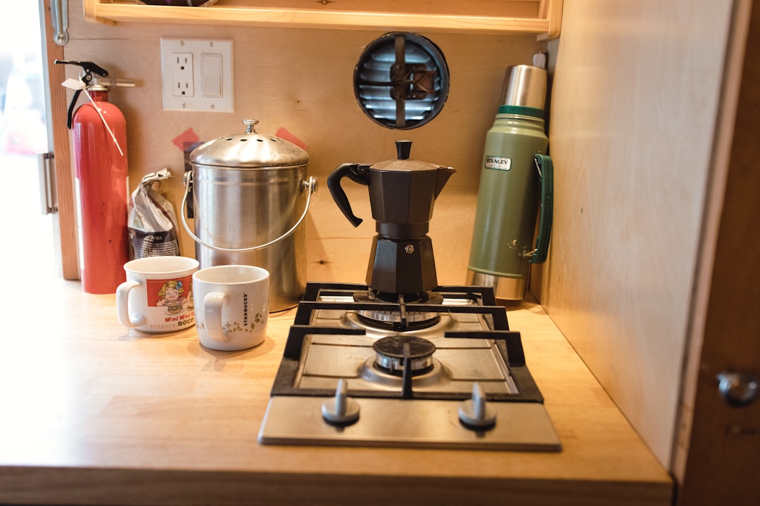 black moka pot on burner